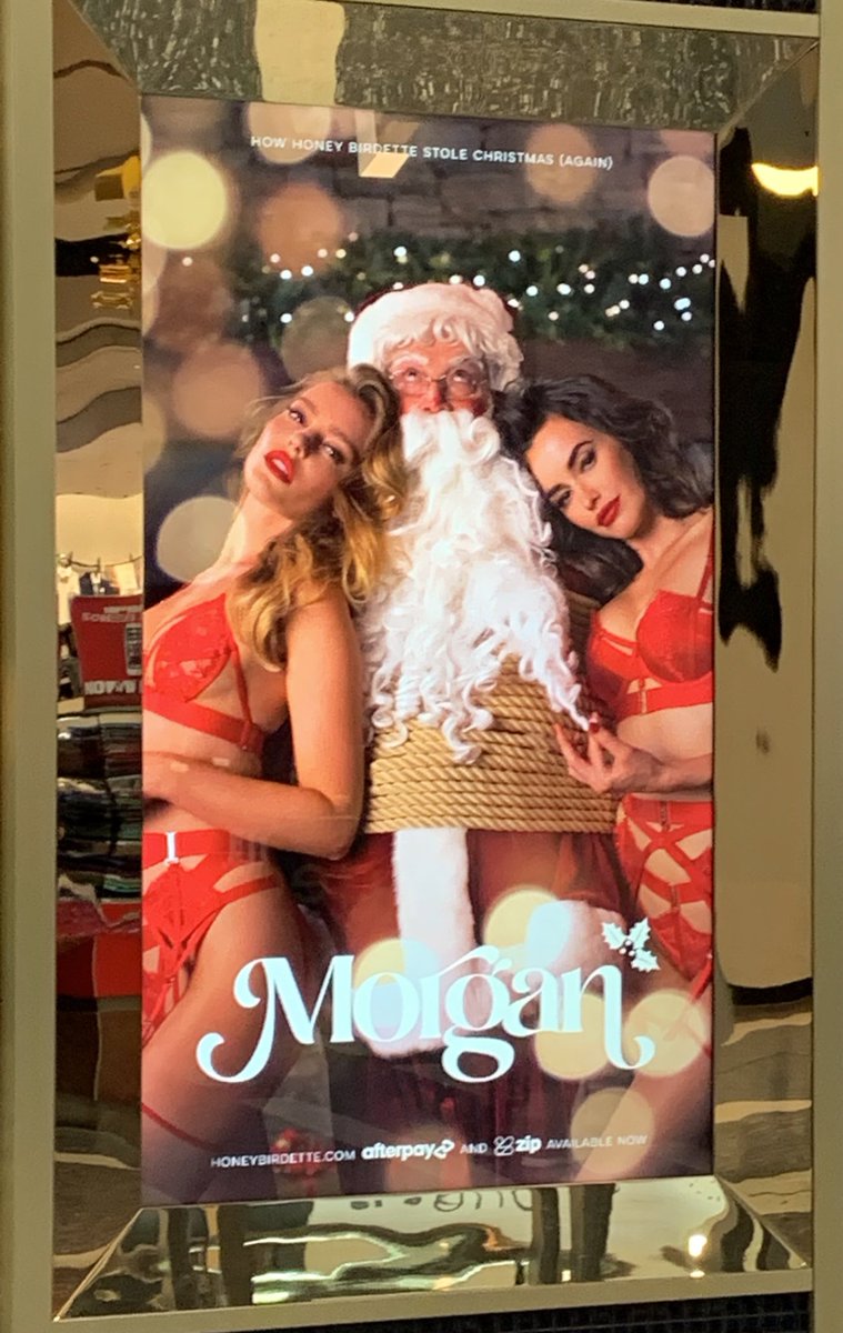 CollectiveShout's tweet photo. Sex shop bondage-Santa, brought to you by @LendleaseGroup & #BrettBlundy’s #HoneyBirdette.
These porn-themed window displays are on show just metres from where kids get pics with Santa.
#CrossEmOff #CrossEmOff2020 #NotBuyingIt #Objectification @champs_change https://t.co/xXddAFO9Jc
