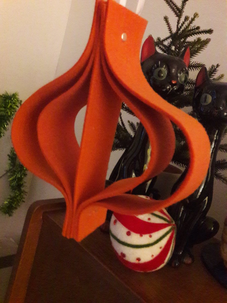 Up bright and early so I used the time to make a prototype mid century Christmas ornament from orange felt. Rather pleased.