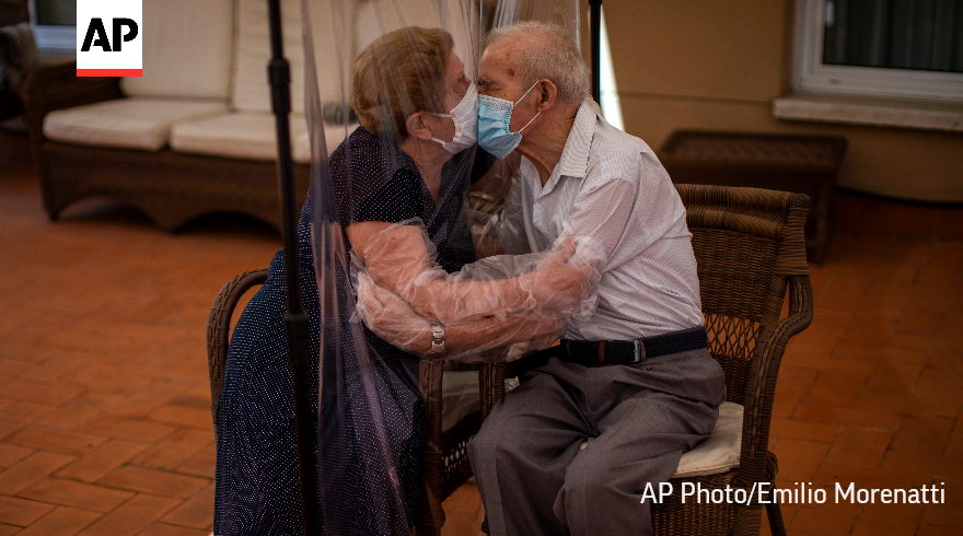 Agustina Canamero, 81, and Pascual Perez, 84, hug and kiss through a plastic film screen to avoid contracting the coronavirus at a nursing home in Barcelona, Spain.

Photos capturing love are among the <a href="/AP/">The Associated Press</a> photos of the year. apne.ws/ttLKrXW 

#APPhotos2020