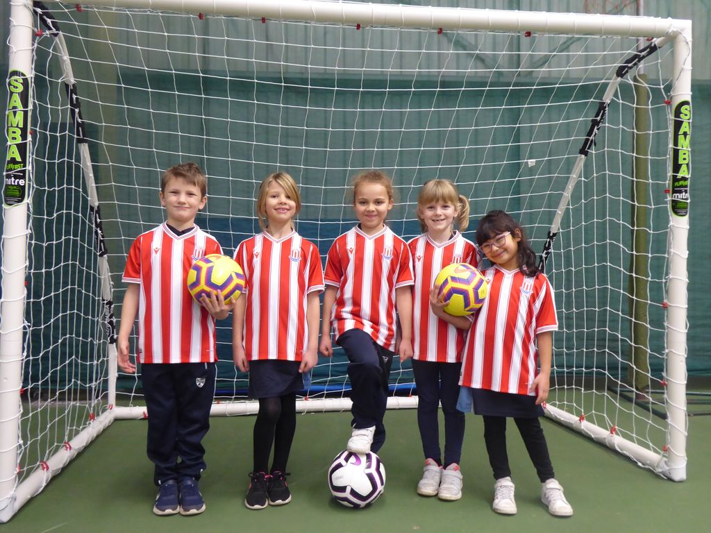 StDominicsStone's tweet photo. P2 were really excited to receive their Stoke City 7's replica shirt this week, generously donated by our very own local team Stoke City FC. The club have also promised to gift them each a pair of match tickets when it is safe to enjoy a home game again.
#SCFC #sportengland https://t.co/zIloXfRKv3