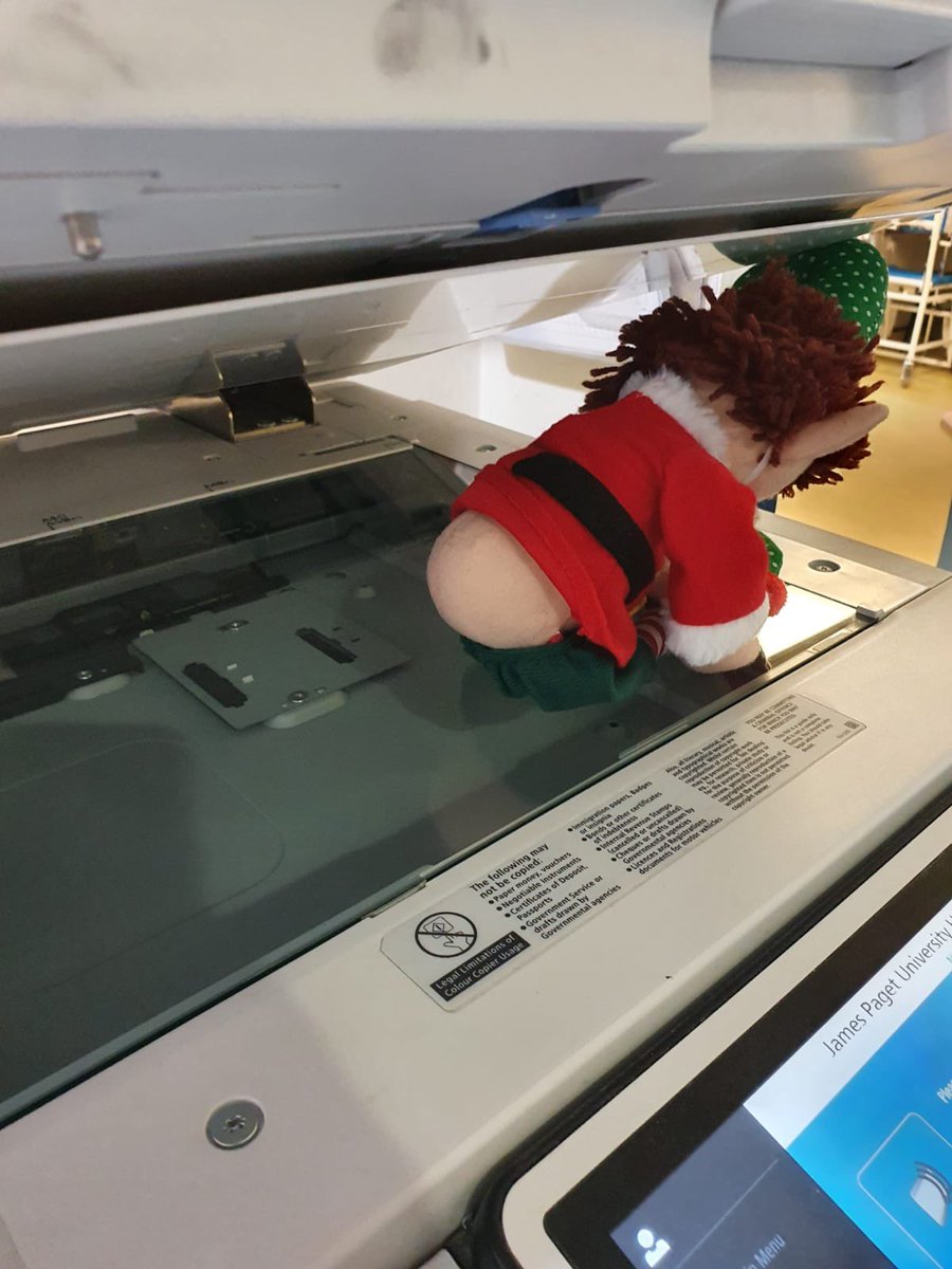 bishy78's tweet photo. Day 11, NeeNor is getting naughty, today he was found to be operating the photocopier 🙈 @TheElfCompany #nhsheroes #NHSelf #makingstaffsmile #elffun #christmas #Decemberfun #nhsstaff #nhschristmas https://t.co/OAE6oBKGaF