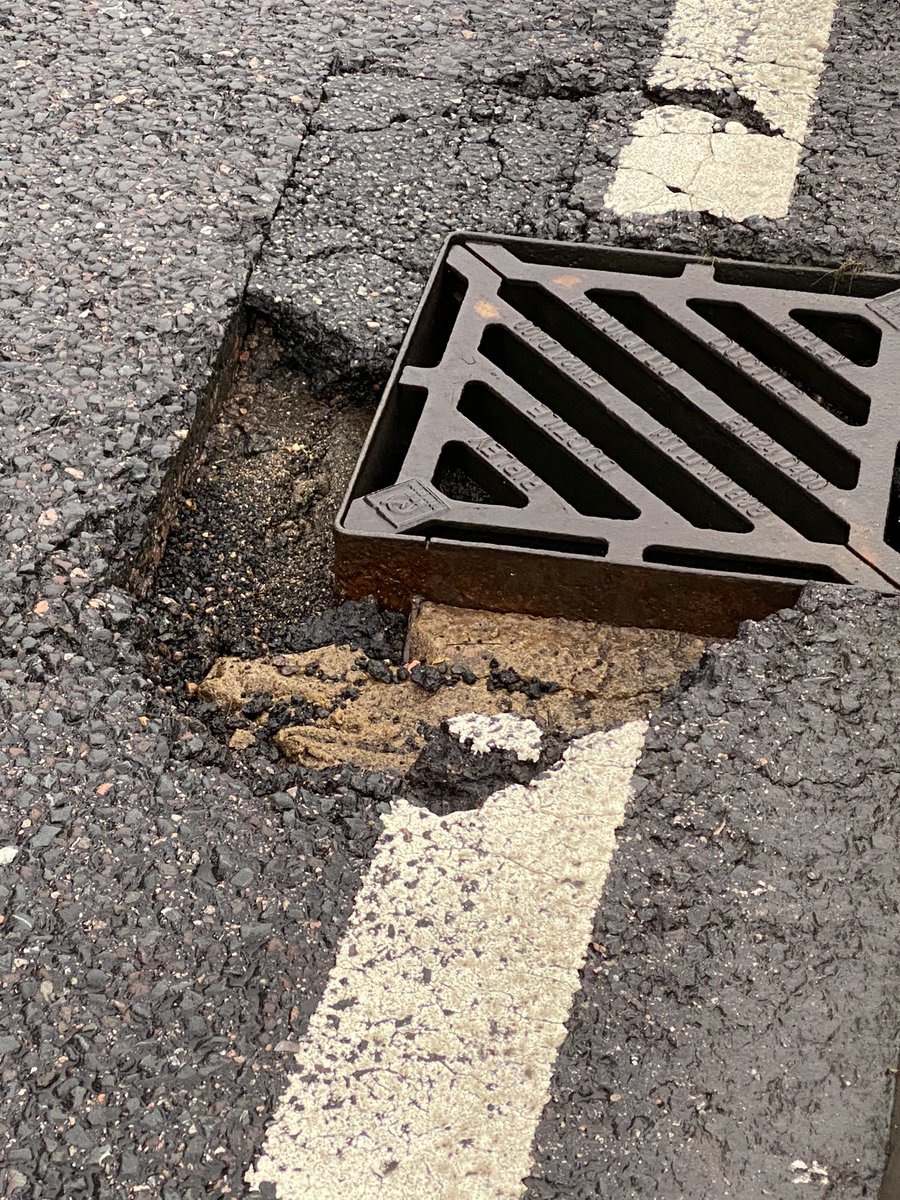 KeithSavill's tweet photo. @Essex_CC Massive and very dangerous pothole in Eight Ash Green. Your on line reporting system tells me to “phone immediately” but then the phones are only open Monday to Friday. This needs urgent attention! https://t.co/jqy5t7IXXU