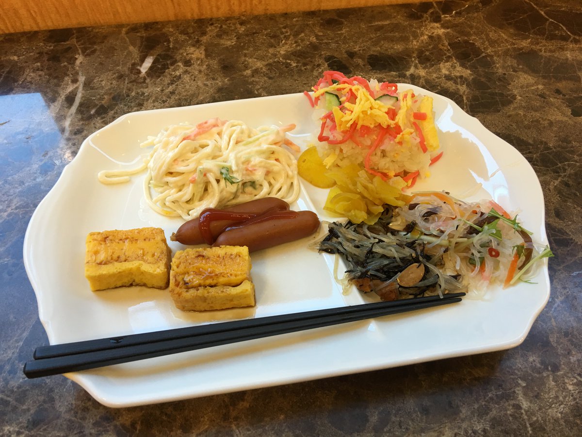 Ohayo gozaimasu! That's good morning, in Japanese.Here's the standard included breakfast at a Toyoko Inn, my favourite business hotel chain.From top left: pasta salad (no really), rice with pickles and toppings, noodle and seaweed salads, franks, and tamagoyaki omelette.