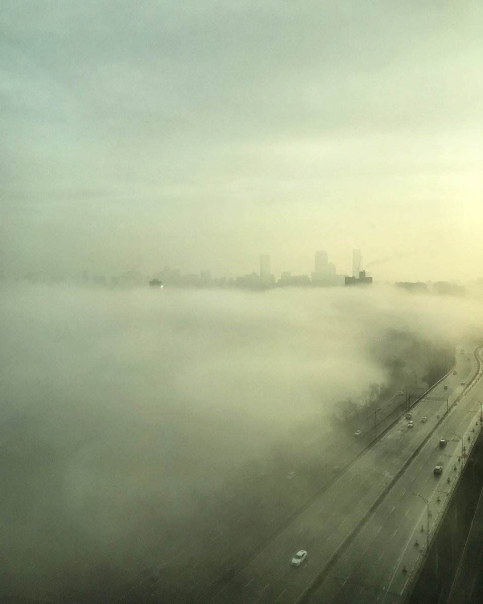 OnlyInBOS's tweet photo. The fog at 7AM vs 8AM in Boston today. https://t.co/la3RShwO73