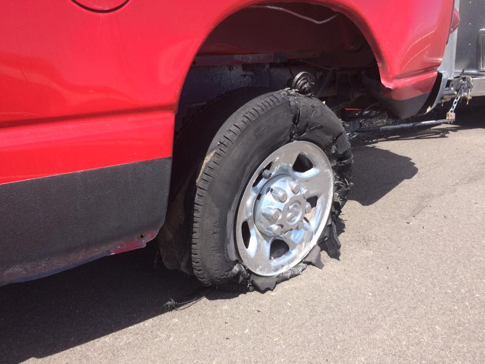 3) You become resourceful. Sometimes, shit happens. We had a tire blow out in the middle of Utah. Things go wrong all the time, and the more that you can do yourself, the better off you will be. Picture: Our *actual* tire blow out.