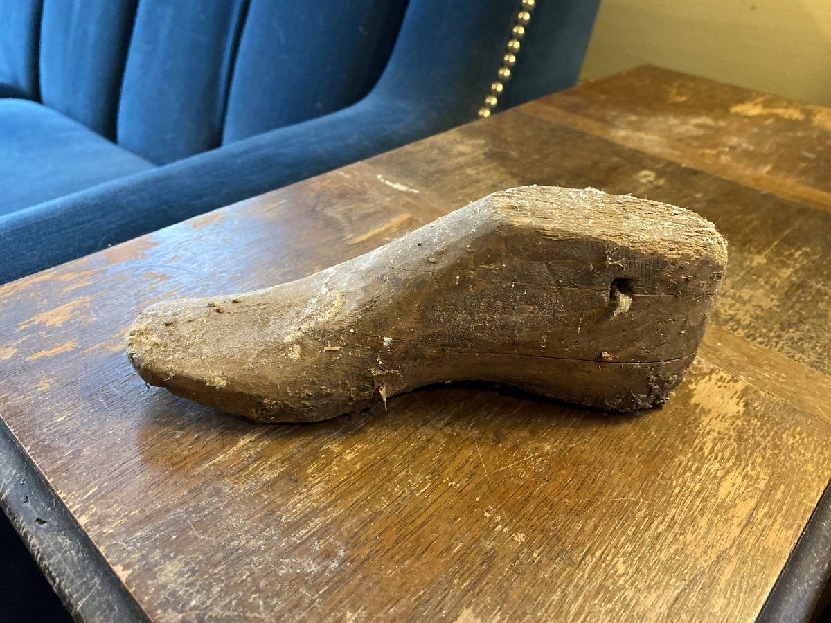 On top of another, in the same position, was a wooden form the size and shape of a child’s foot.