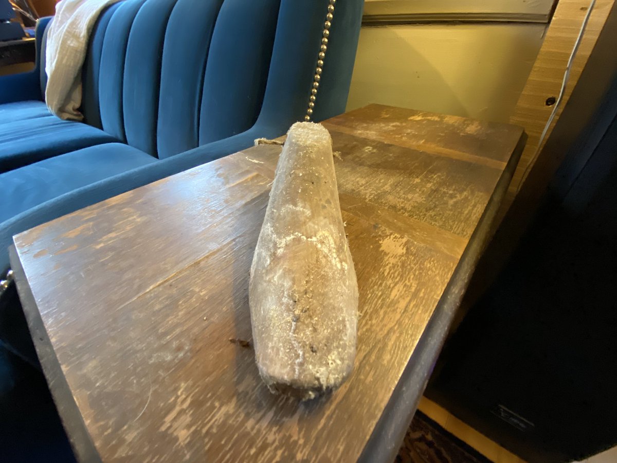 On top of another, in the same position, was a wooden form the size and shape of a child’s foot.