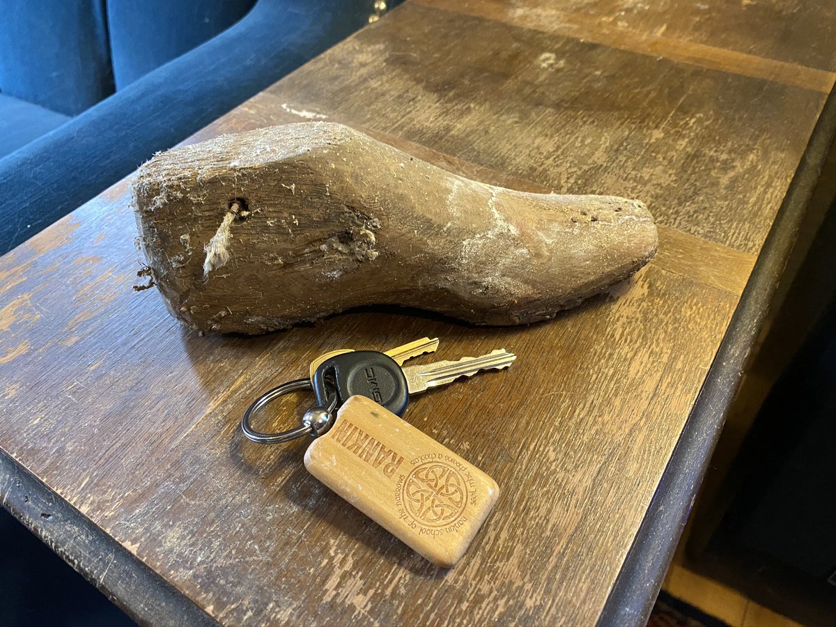 On top of another, in the same position, was a wooden form the size and shape of a child’s foot.