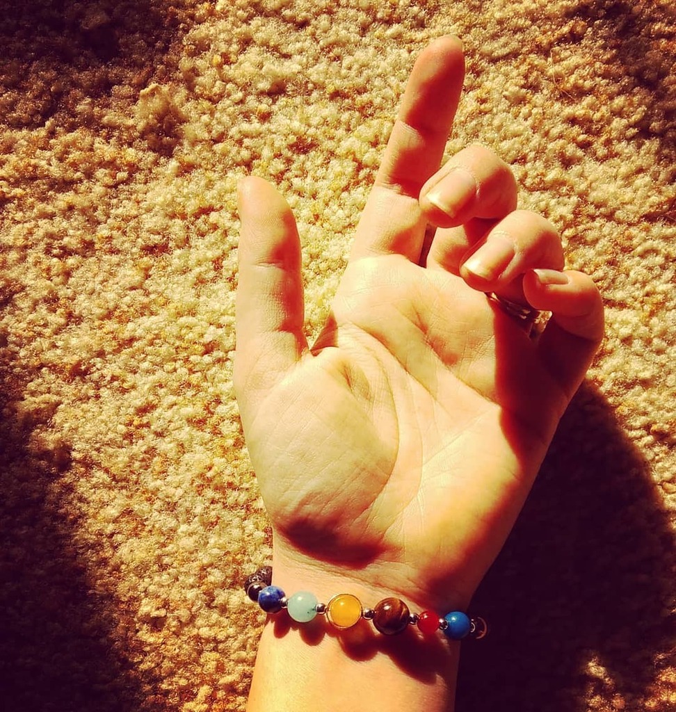 Livin4theLamb's tweet photo. The Solar System's on my wrist. And Pluto's there, too!
#thesolarsystem #jewelry #originalphotograph #space #sunnylight https://t.co/Zvyz3TmOdK https://t.co/ixP6pFCc6W