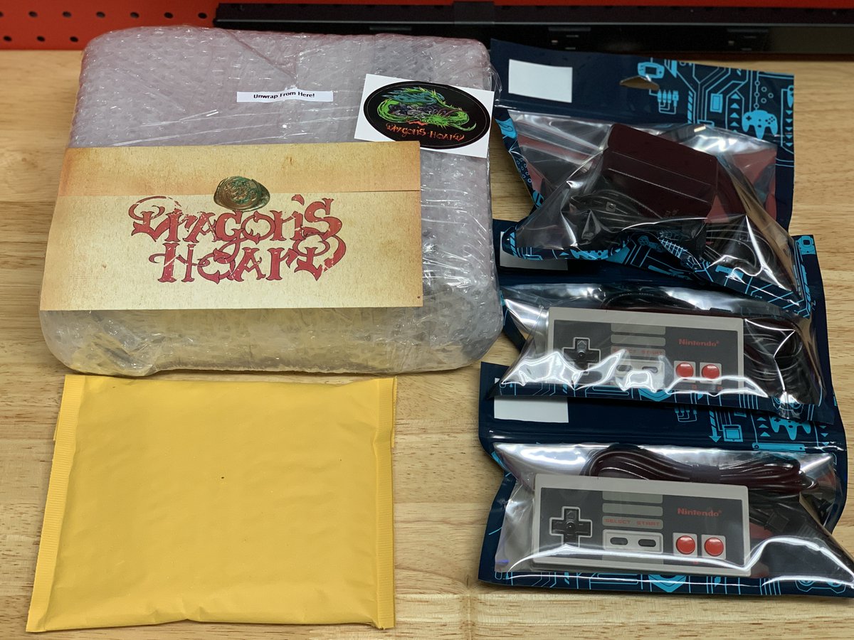 DragonsHoardGmg's tweet photo. Boxed up and ready to head home to it's new owner! Packed well with plenty of cushion. Hopefully makes it before Christmas, who knows with the way things are these days.🤷‍♂️

 I've got 2-3 more #HiDefNES kits I will do my best to try and get a similar lot up before the new year.👍 https://t.co/dBPRXhKp5g