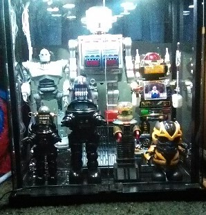 DrMickLethal's tweet photo. @white_arrow_uk @BlueelvisEric @LauraLeeBordas @OnAngelWings @chetbtester @Lily7Tiger @Duckman1001 @1shawnster This is just the collection that's in the Toy Room, I have a glass display cabinet filled with my Vintage Tin Toys in the Living Room.🤖🚀👽🛸#LethalToyCollection https://t.co/BNdCradLGn