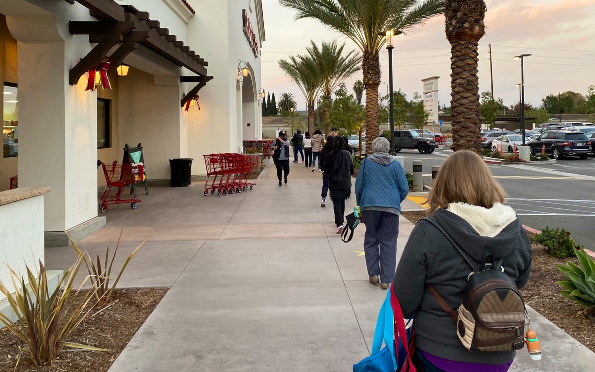 KeithAndrewRowe's tweet photo. Standing in line at #TraderJoes, catching a cold to avoid getting #COVID19. https://t.co/Io4z7TChX4