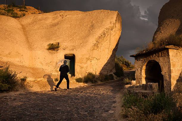 Turchia8's tweet photo. GOREME, CAPPADOCIA, TURKEY - 2015/06/07: Late afternoon in the streets of Göreme, a traditional village with fairy chimneys in the heart of Cappadocia, Turkey. (📷 by Marji Lang/#LightRocket via #GettyImages) https://t.co/7ERLDmbWdH