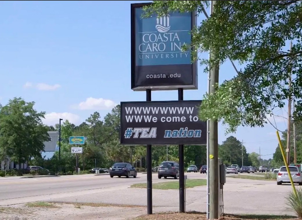 The new sign may not be grammatically correct, but it is factual.