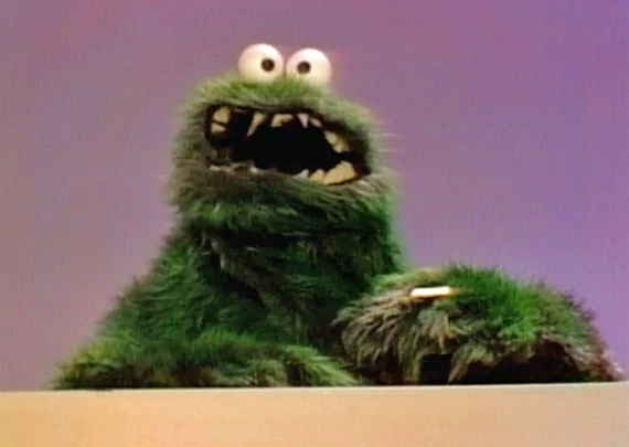 Cookie Monster used to be green, and had TEETH.