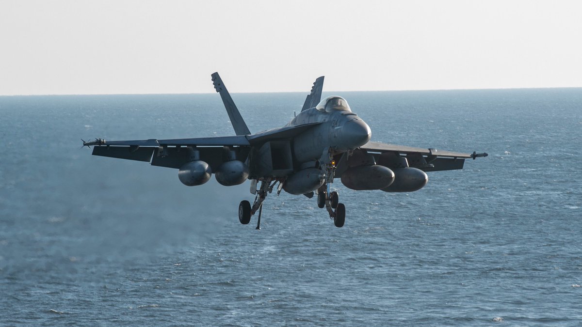 #CVN68 | A #USNavy #VFA137 F/A-18E Super Hornet lands aboard the #USSNimitz on Friday.
The Nimitz is serving in the @US5thFleet in the Arabian Sea, protecting both civilian and military aircraft and sea vessels for maritime stability.
[Image: @USNavy /MCS J. Calabrese] #avgeek