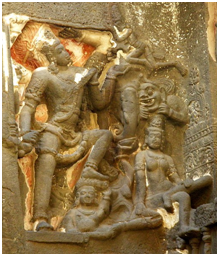 Shiva pierced Andhaka’s chest with a trident. He held the trident aloft, with Andhaka transfixed to one of its prongs, And with his trident held aloft Shiva began to dance.Ref: Ellora Caves, ASI monument