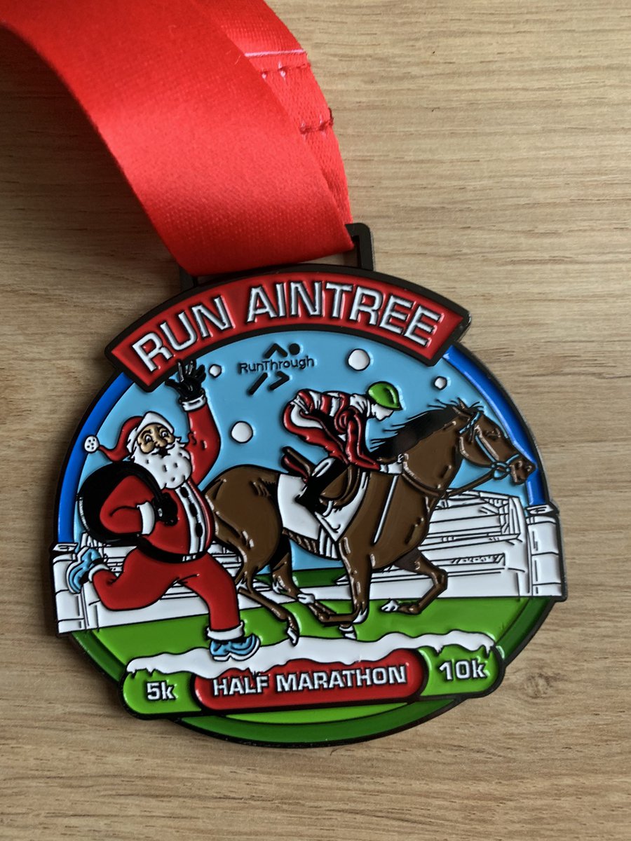 Andy_Barton's tweet photo. Aintree half Snickers. Wet and windy but good fun.
Glad they didn’t have to put the little white tent around me at the end. #runaintree @RunThroughUK https://t.co/rYrPDtT3ru