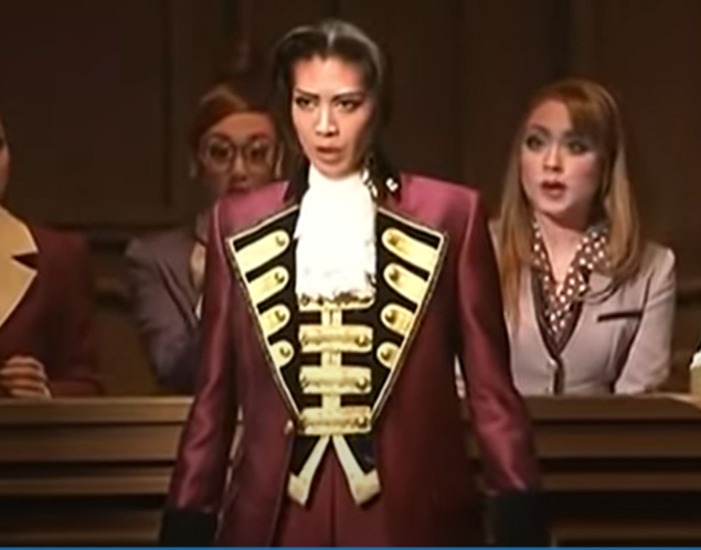 Also Miles' Big Character Moment at the end of the musical when he decides to face his father and pursue the truth has him in...... his bratworth suit. Which is pretty much the EXACT OPPOSITE of what they're going for. I get big costume changes to signify character growth...