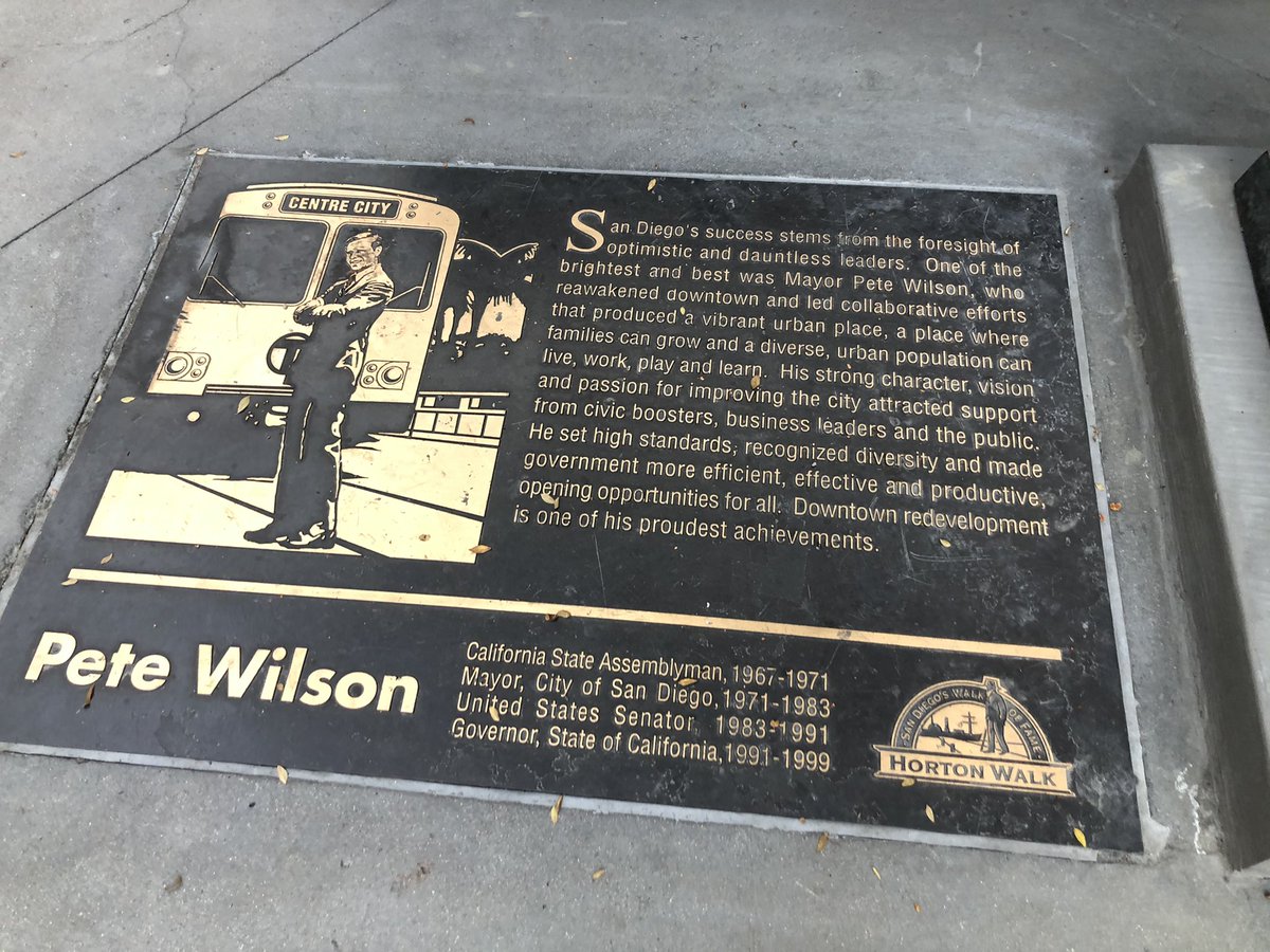 WTF WITH THE TROLLEYS?! Then I realized why: at the base of Wilson’s statue is this plaque...WITH A TROLLEY!