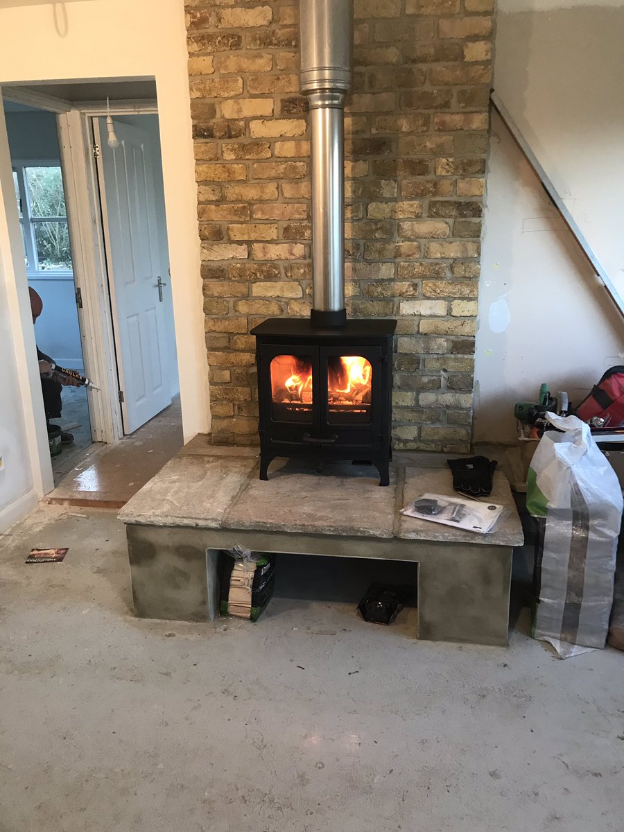 A <a href="/CharnwoodStoves/">Charnwood</a> island 1 multi fuel stove with <a href="/specflue/">Specflue</a> @Metaloterm chimney system fitted in porchfield on the #IsleofWight #woodburner #hearth #fireplace