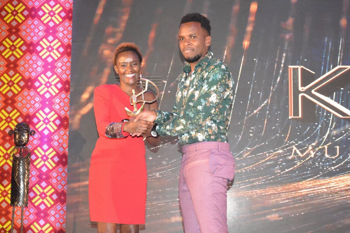InfoKfcb's tweet photo. Thank you Dr. @FredSimiyu_ for expanding horizons or the @kisimamusicfilm and giving them a Pan-African face ~ @EzekielMutua.
#KFCBatKisimaAwards2020 https://t.co/8pXhJYeApd