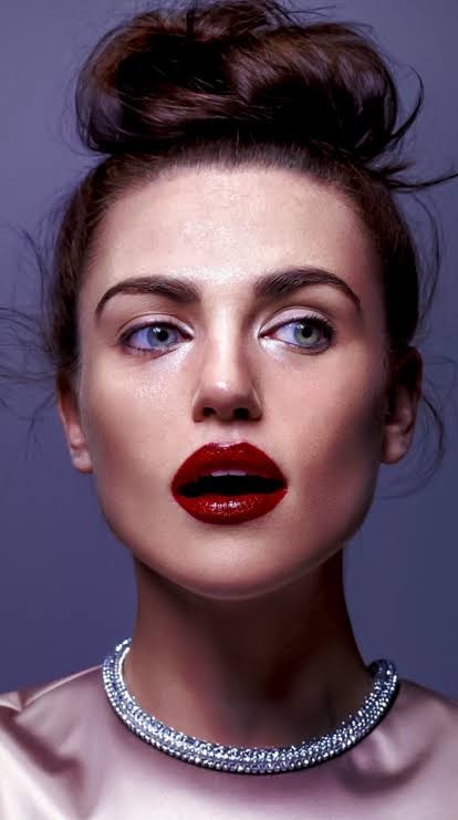 katie mcgrath featuring her heterochromia; a thread