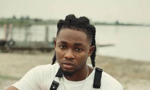 CanaryMugume's tweet photo. Just in: Nigerian Artist Omah lay has been arrested by Katwe police, together with the manager of the venue where he performed from last night; Dungu Ivan and the Events manager Prim Kasana, all are in custody, @Lukowoyesigyire confirms. https://t.co/5riwEfmlmC