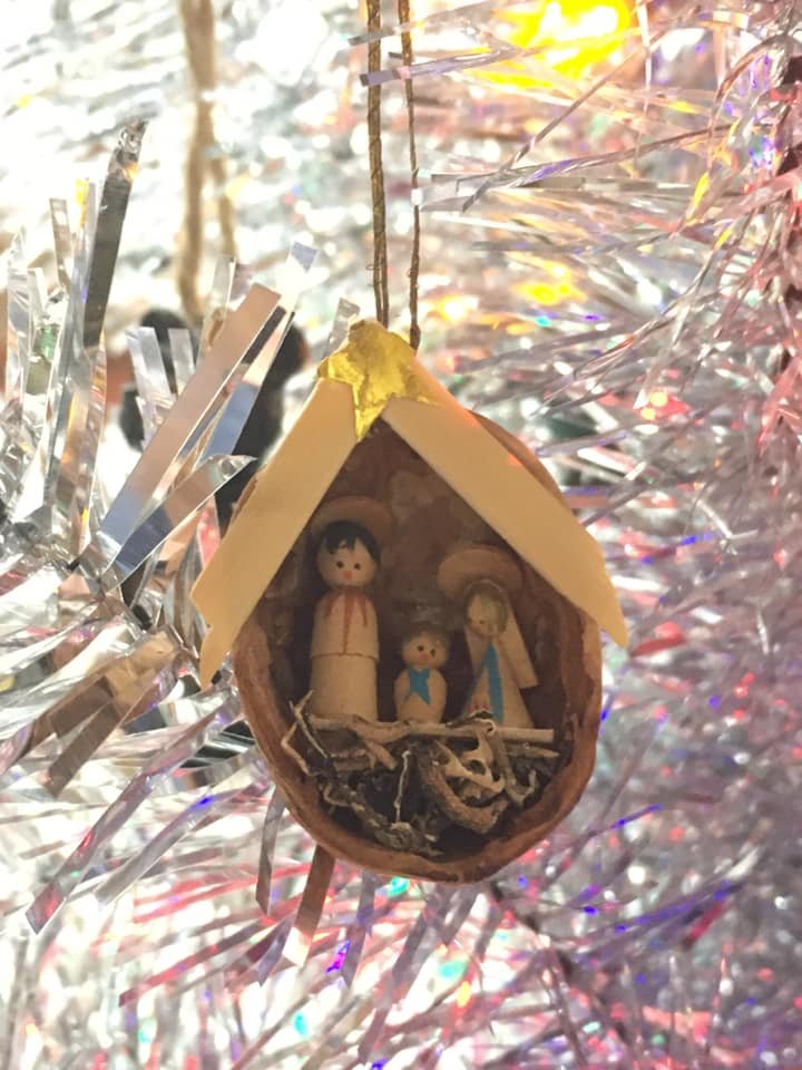 This is my nativity. For a while my mom would get us all ornaments for presents because when we were adults she wanted us to be able to have decorations for the tree already.This is one of a set. They are inside a half of a walnut shell: