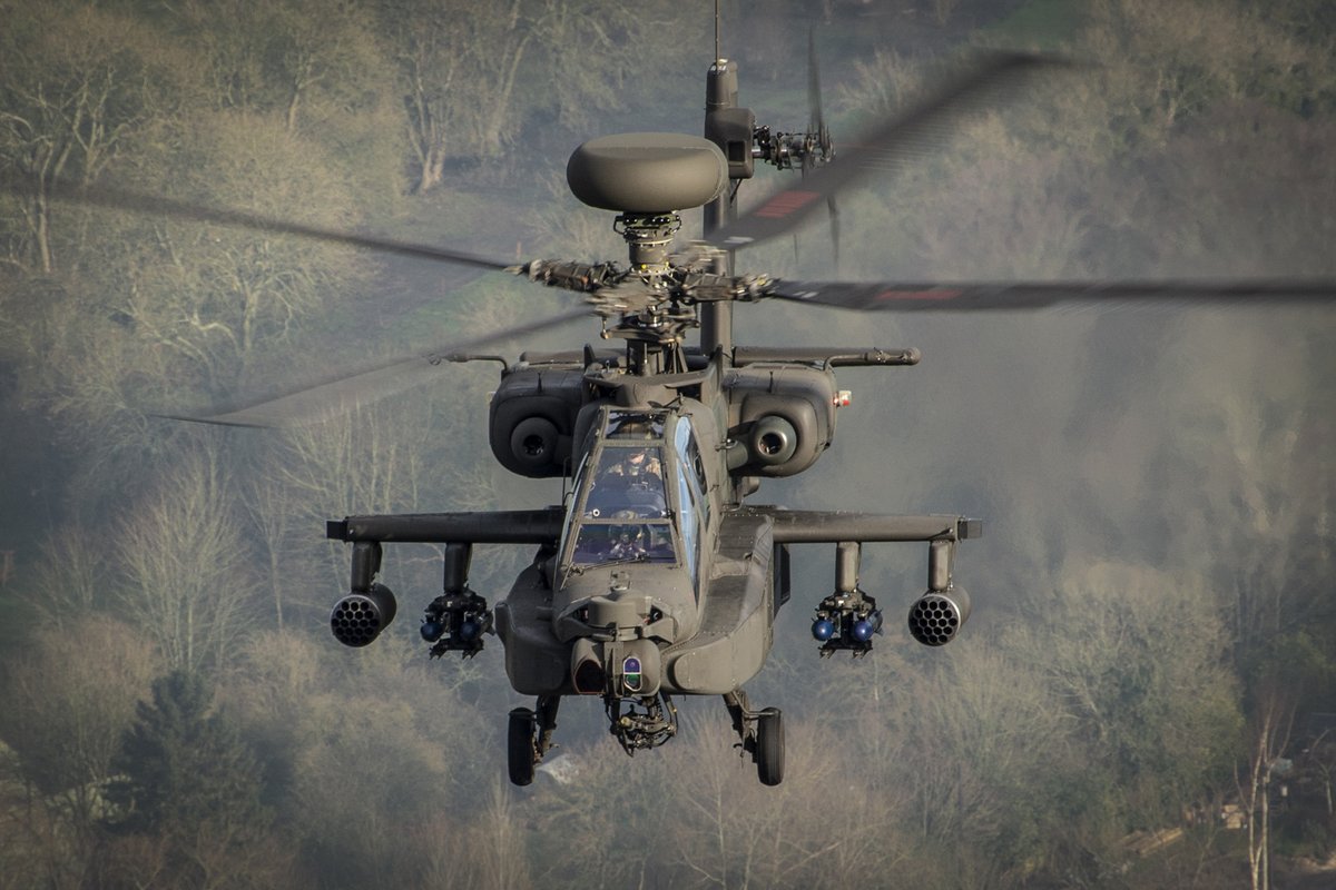 ArmyAirCorps's tweet photo. From vantage points including a Bell 212, MOD photographers based at Army Aviation Centre Middle Wallop were able to capture and record the 8-ship flypast by eight Apache Mk.1s before they headed to Wattisham Flying station last week.🙌🚁 https://t.co/UDrG1JeuZO