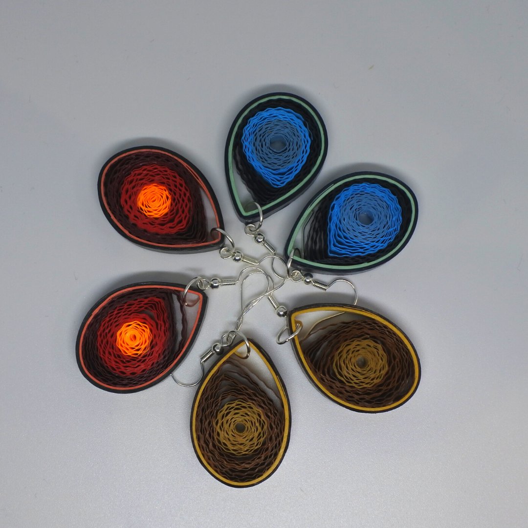 CreationsIgana's tweet image. All my earrings are made of paper, ear hooks are hypoallergic. They are very light in weight. I cote the earrings in a see-through solution for water resistance and durability. Each pair is unique as they are hand made. 
etsy.com/ie/shop/IganaC…