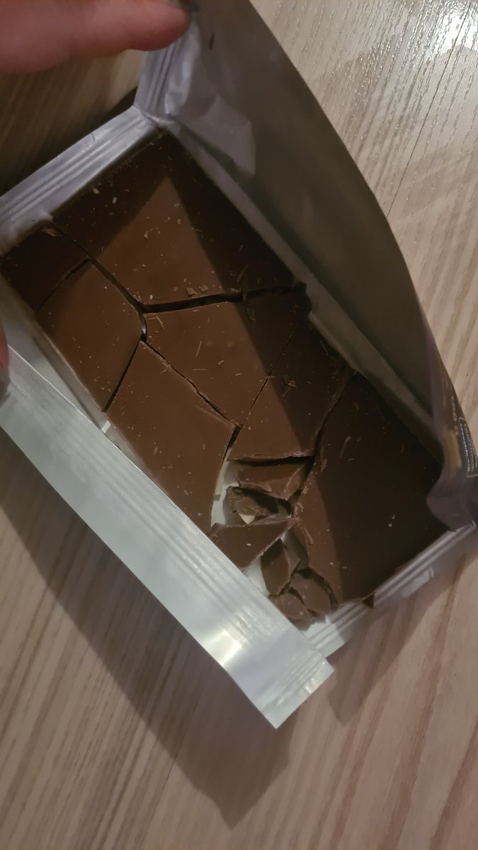 Majeczka83's tweet photo. Thanks @CadburyUK... ordered two christmas cottage kits from your website for my god children I haven't seen in ages due to restrictions and now their little faces are covered in tears as all chocolate in the kits was broken... thanks again for ruining their evening #notocadburys https://t.co/eTBUejWIna