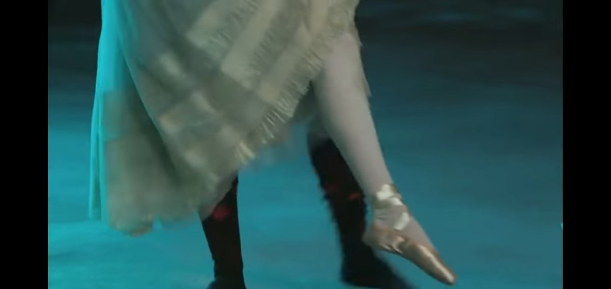 A second behind the scene photo is this one. It didn't make it into the movie for obvious reasons. Her foot is completely relaxed and not pointed and her knee is bent. Literally the most basic thing in ballet is to point your feet. How does she have "perfect technique exactly???