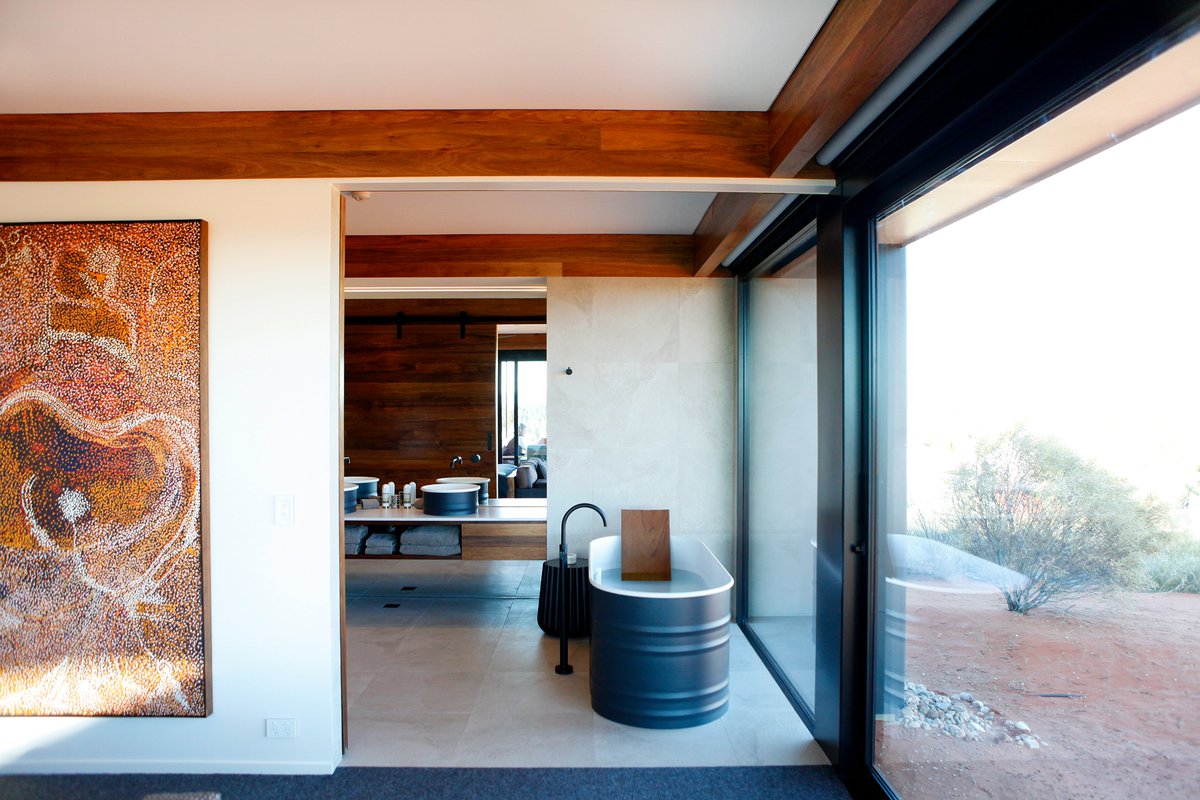 The Dune Pavilion's tub-nee-tank is big enough for two; although with dual bathrooms it's not necessary to share. There's just the matter of which dreamy view you'd like to soak in, Uluru or Kata Tjuta... #Longitude131