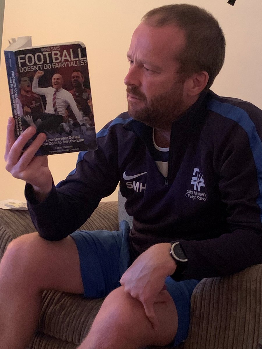 SaintMichaelsCE's tweet photo. Reading In PE: If you didn’t know, Mr Holden’s happy place is also Turf Moor! A book he is reading is “Who Says Football Doesn’t Do Fairytales?” by Dave Thomas-the story of how Burnley FC defied the odds and joined the elite level of the Premier League #StMichaelsPE #ReadingInPE https://t.co/6tVojnGg7J