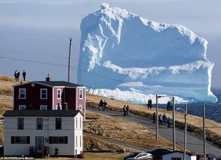 🔥 150 ft. Iceberg passing through Iceberg Alley near Ferryland, Newfoundland, Canada