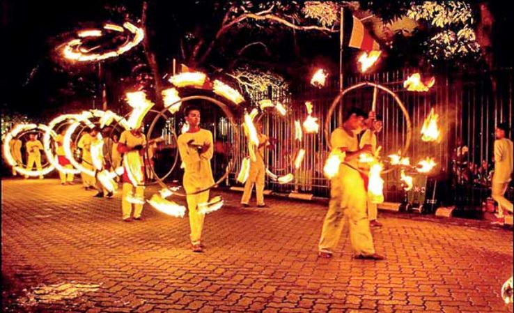 How Sri Lankan religious festivals and customs are timed to function as pest control: 1. The torches carried by villagers as they go to and from temples after dark destroy huge numbers of insects just when these are at their peak breeding time and most destructive to agriculture.