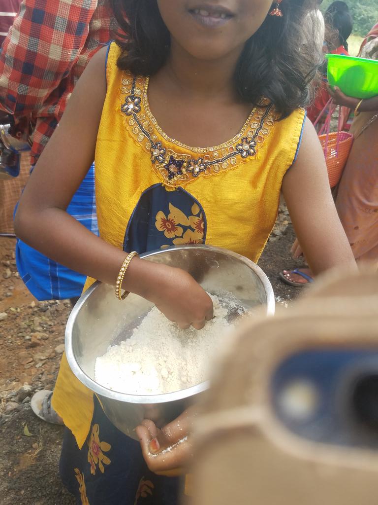 After the poojai is done, the rice-jaggery mix is distributed along with paanagam. Sugarcane used to build the structure for Amman, lemon, onions, banana, garland etc used for poojai is also distributed.