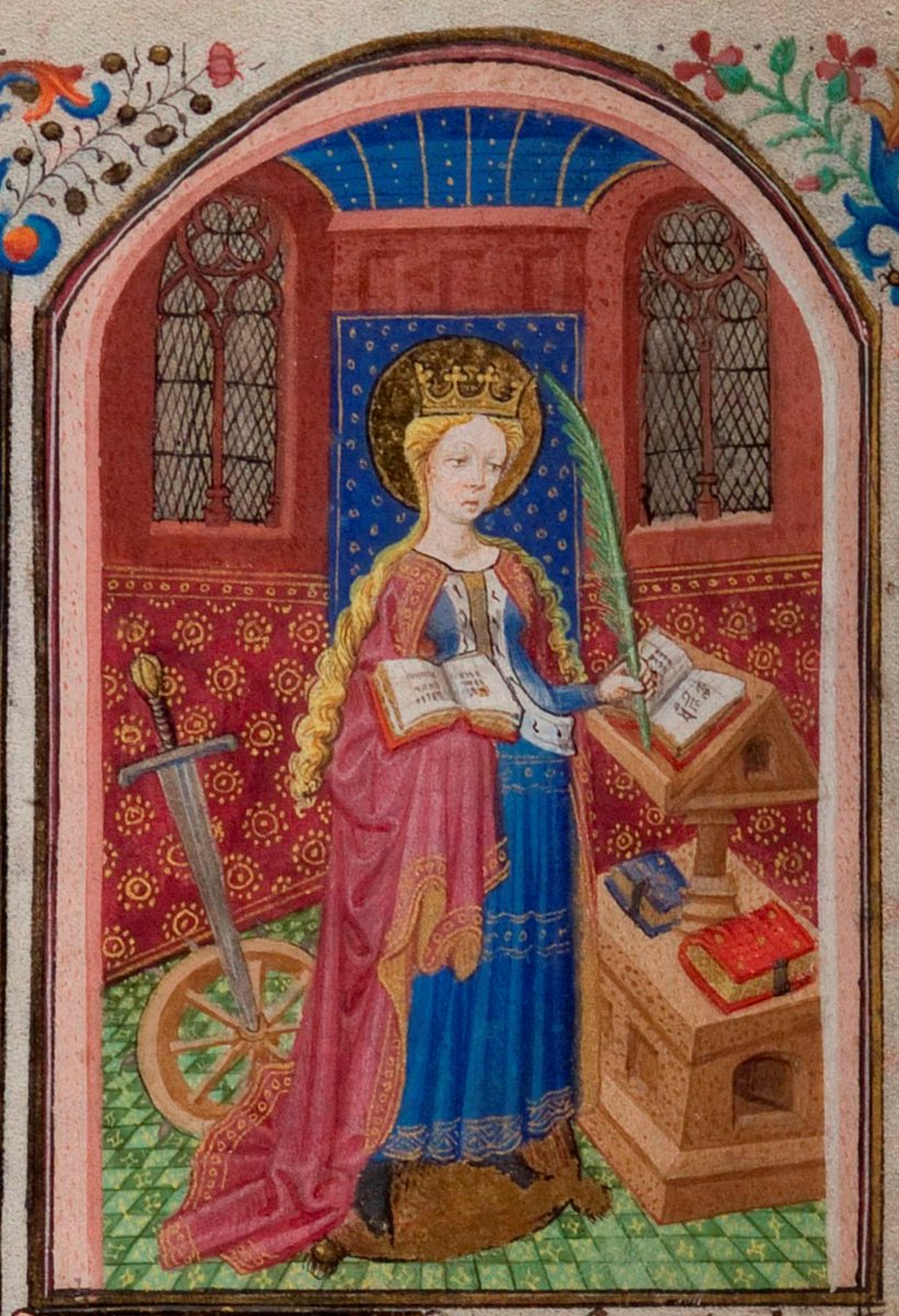 According to legend St Katherine was martyred in 306 or 307. In the C11th her relics were brought to Rouen. This miniature includes the symbols traditionally attributed to St Katherine - books, a wheel and a sword.  #BookofHours