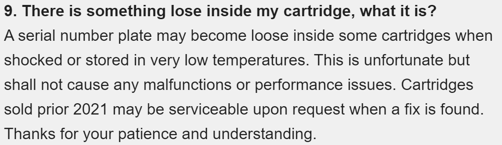 Disappointing to hear, but these things happen. As long as it's not a conductor, it's not really a problem. Physical manufacture of cartridges is HARD, like, REALLY HARD, and pulling a whole batch to deal with this could bankrupt a company of this size.