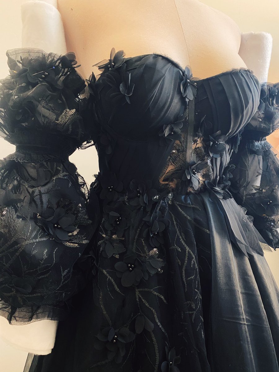 A folklore inspired wedding dress, a black wedding dress, a dress entirely sewn by hand made from chainmail and a dress made for the film Wonderwell