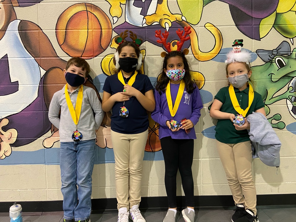 HealthPse's tweet photo. Christmas run at PSE!!! Students are receiving this awesome medals curtesy of our amazing principal @DunnB3 #healthfitness #pse#sbisdproud https://t.co/V2Gql6VNBE