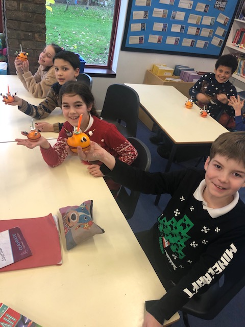 ClaygatePrimary's tweet image. As part of our topic learning about #Christianity and light, Rowan class have been enjoying making #Christingles. Don't they look wonderful!