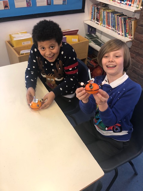 ClaygatePrimary's tweet image. As part of our topic learning about #Christianity and light, Rowan class have been enjoying making #Christingles. Don't they look wonderful!