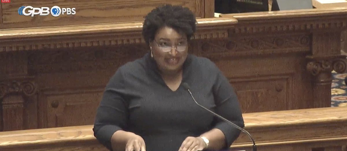 Stacey ABRAMS was just elected by her fellow electors to preside over the meeting.  https://www.politico.com/news/2020/12/14/electoral-college-biden-victory-444952