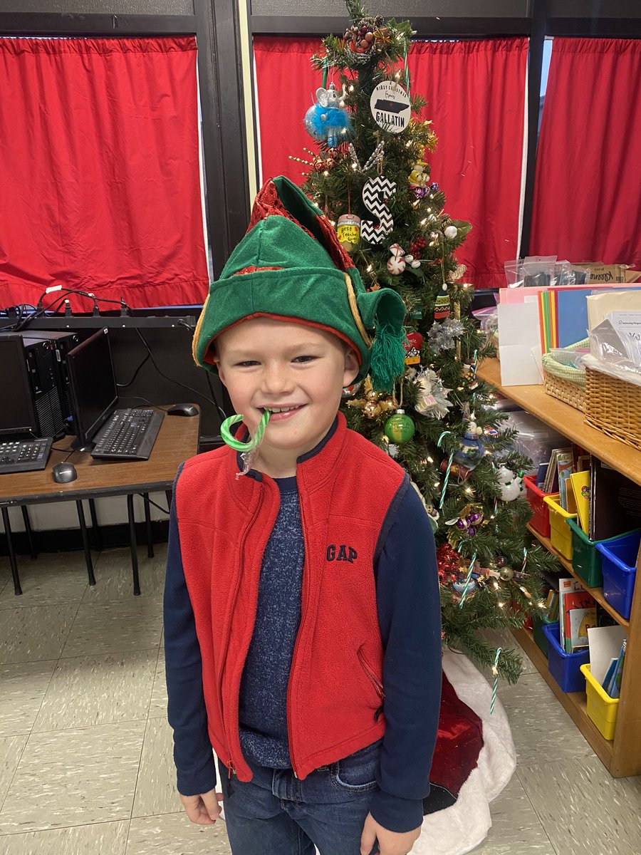 Elf Day #6  This kid is smart and hilarious! The candy cane tops off the out “Elf” appearance. #readytodeliver