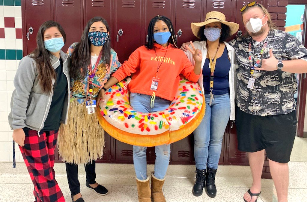 MesquiteHS's tweet photo. On the eighth day of our holiday countdown, our staff decided to lei out summer attire since many had to forgo summer vacations! #SummerWonderland #MHS12Days https://t.co/MK5JHWC7a0