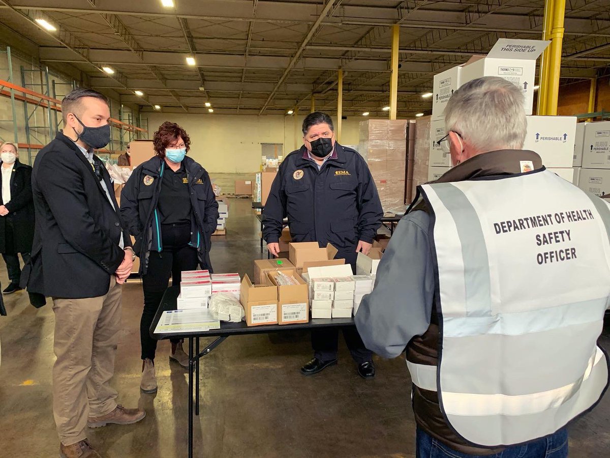 GovPritzker's tweet photo. I'm proud to report that Illinois’ first vaccine doses have arrived safely and are now being processed to go to our hospitals. I was elated to witness our first shipment arrive at the Illinois Strategic National Stockpile and have great appreciation to those who made it possible. https://t.co/QgsODzlYhN