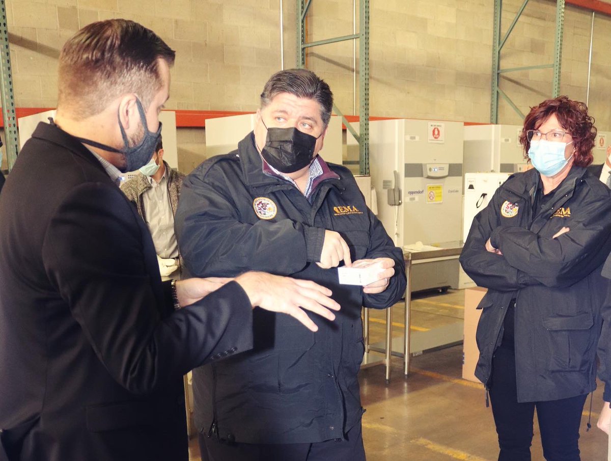 GovPritzker's tweet photo. I'm proud to report that Illinois’ first vaccine doses have arrived safely and are now being processed to go to our hospitals. I was elated to witness our first shipment arrive at the Illinois Strategic National Stockpile and have great appreciation to those who made it possible. https://t.co/QgsODzlYhN