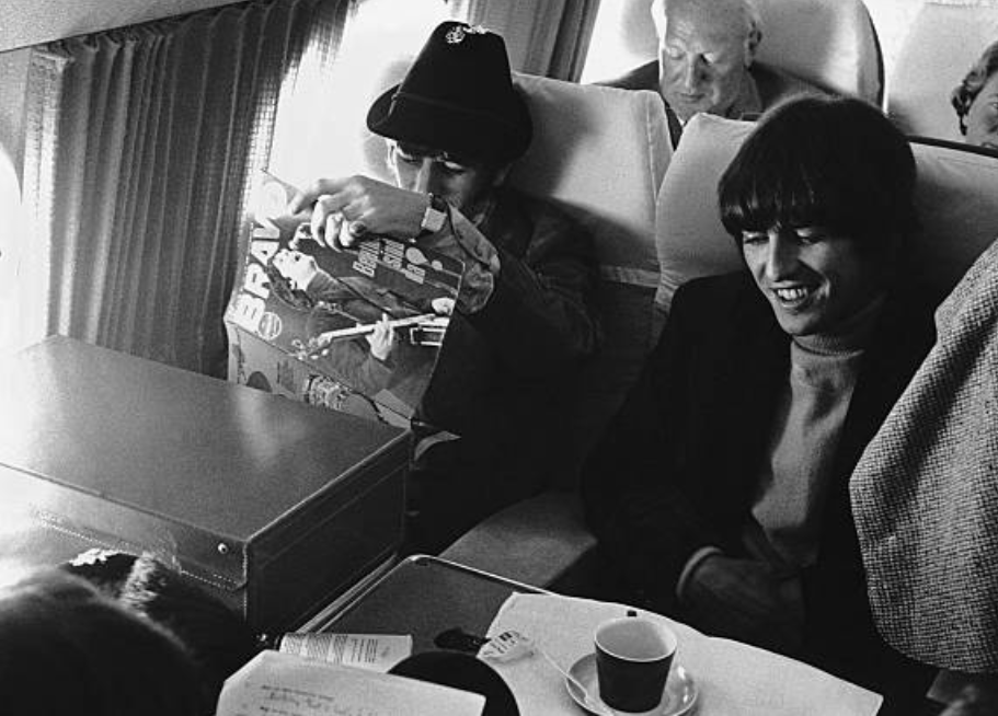 George and Ringo on the flight to Munich, June 1966 The #Beatles via @fabgeorgeh